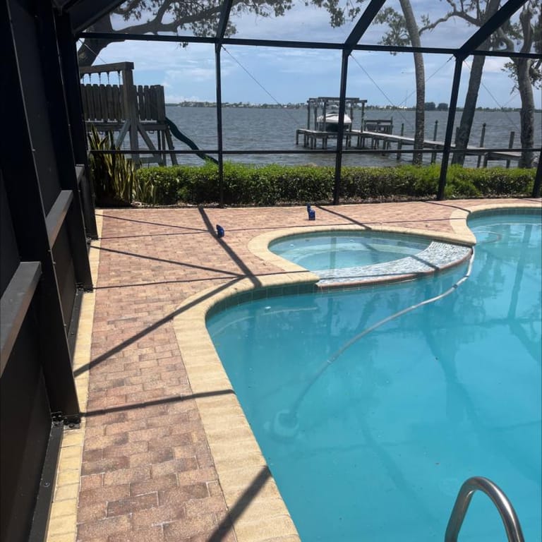 Pool enclosure and screen cleaning result at a Brevard County, FL home