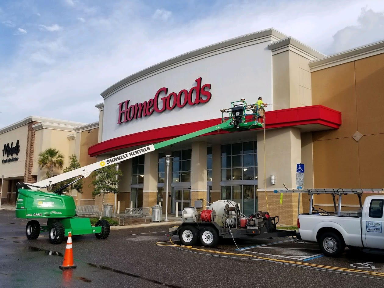 Commercial storefront and sidewalk pressure washing for a retail property in Brevard County, FL