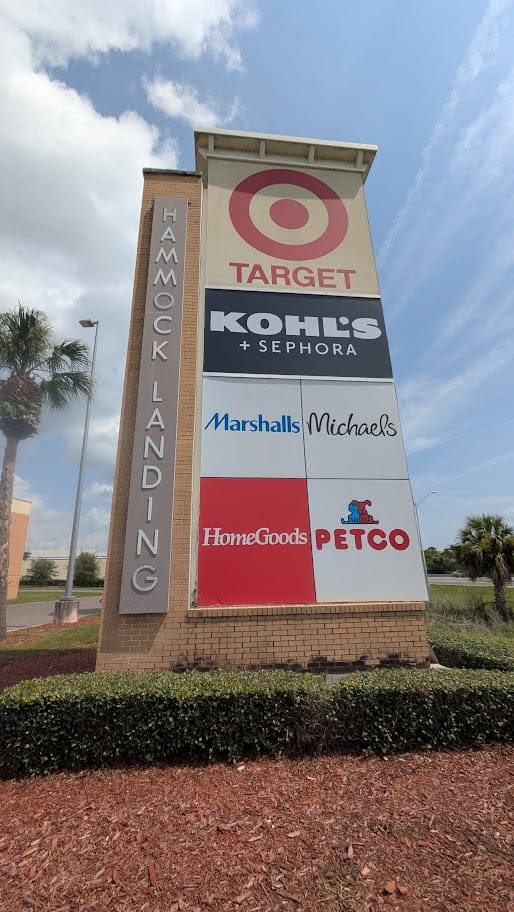 Hammock Landing monument sign listing Target, Kohl's, Marshalls, Michaels, HomeGoods, and Petco in Palm Bay, FL